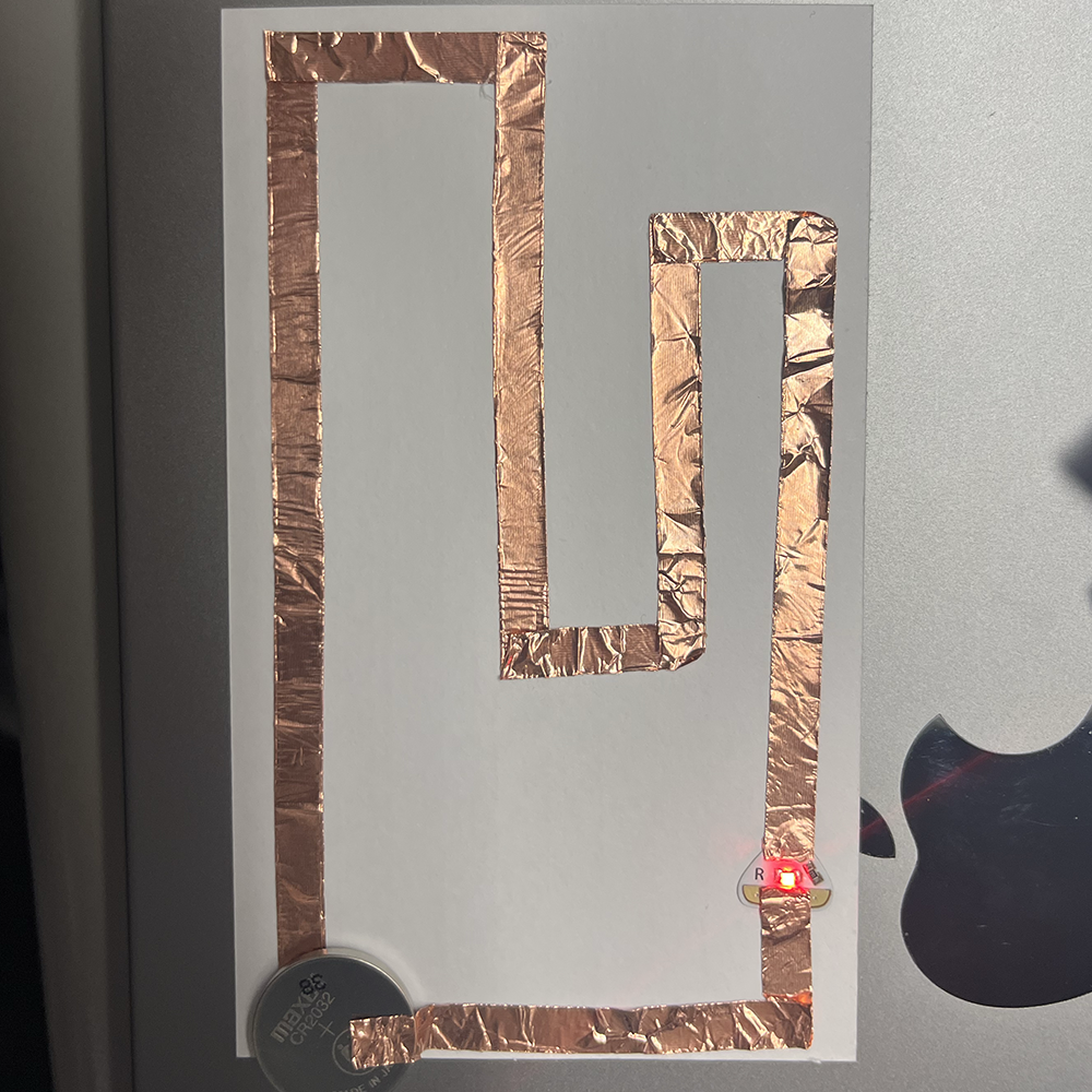 Making test of low voltage electricity through complex pathway using copper tap and light working.